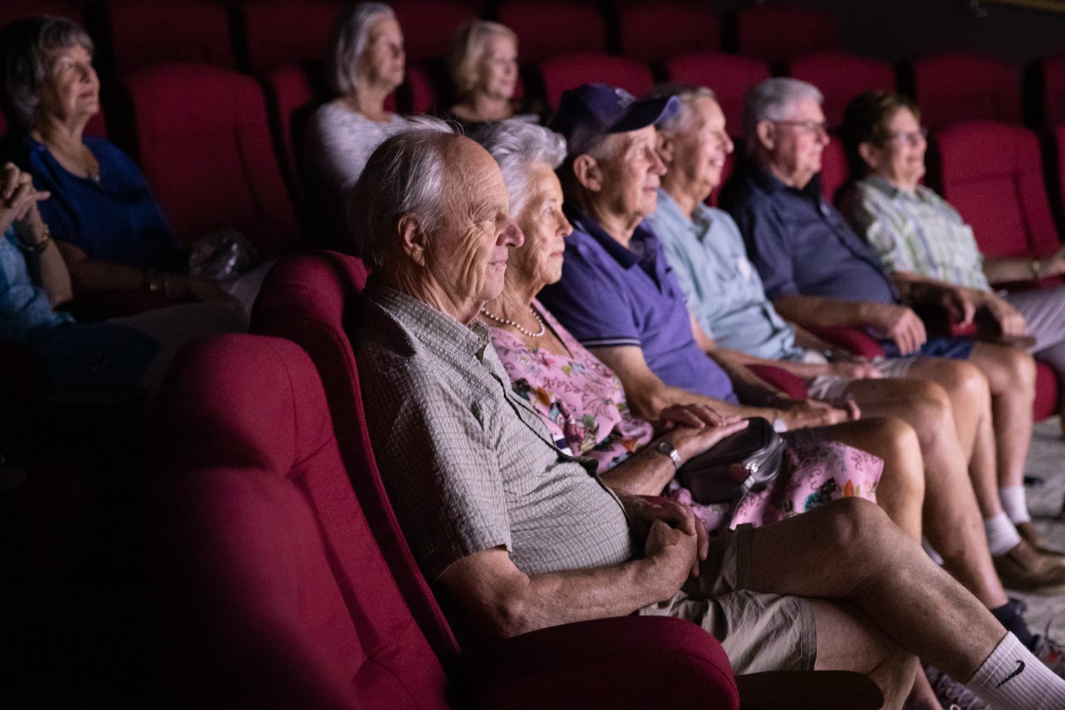 Residents enjoying a film in the boutique cinema at St Andrew's Village